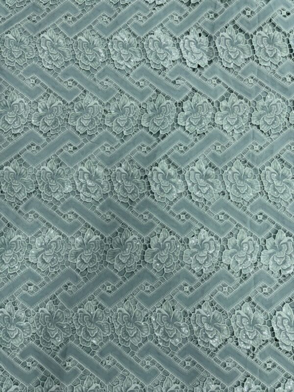 Sequins and embroidery on crochet material