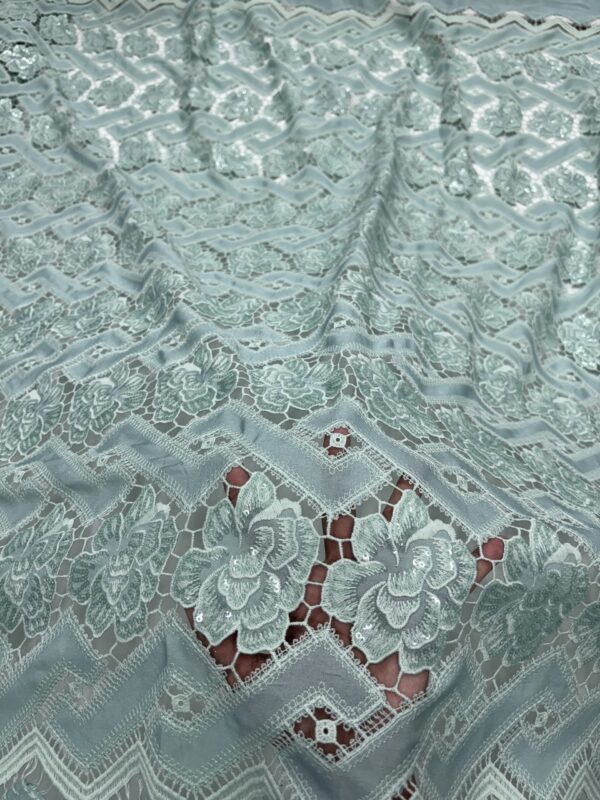 Sequins and embroidery on crochet material