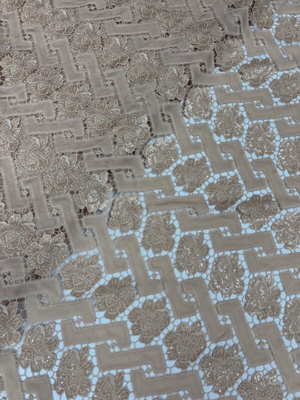 Sequins and embroidery on crochet material