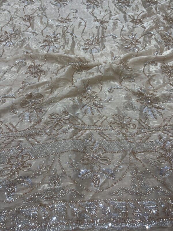 Laser cutting flower work with sequins, cutdana and Daman on Glass Tissue Fabric