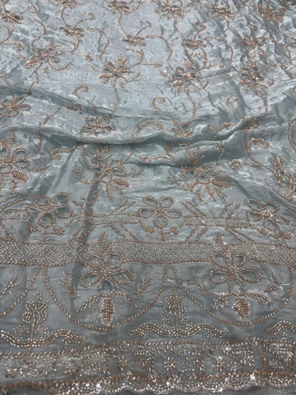 Laser cutting flower work with sequins, cutdana and Daman on Glass Tissue Fabric